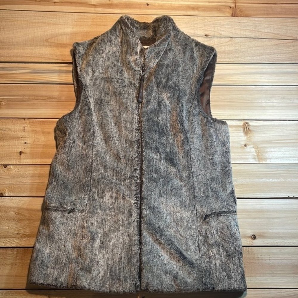 Marisa Minicucci Vest.